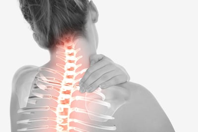 Digital composite of Highlighted spine of woman with neck pain.jpeg